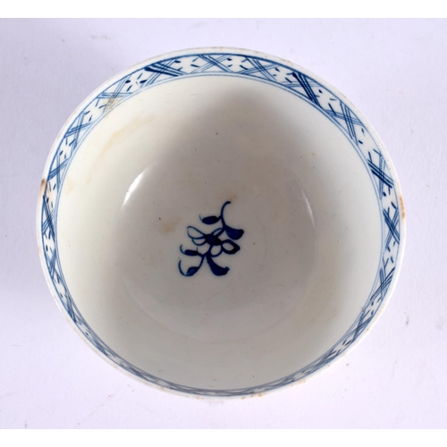 233 - 18th century Lowestoft teabowl and saucer painted in blue with a holed rock and flowering tree. Teab... 