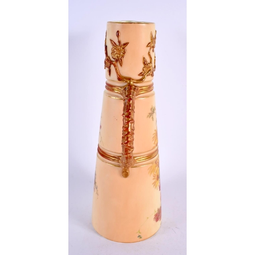 242 - Royal Worcester blush ivory claret jug painted and gilded with flowers. 25.5cm high.