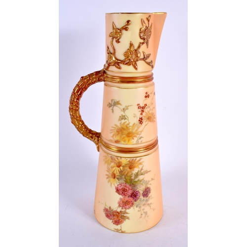 242 - Royal Worcester blush ivory claret jug painted and gilded with flowers. 25.5cm high.