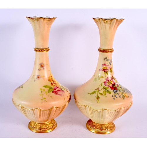 243 - Royal Worcester pair of blush ivory vases painted and gilded with flowers date mark 1899. 26cm high.... 