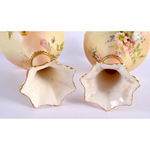 243 - Royal Worcester pair of blush ivory vases painted and gilded with flowers date mark 1899. 26cm high.... 