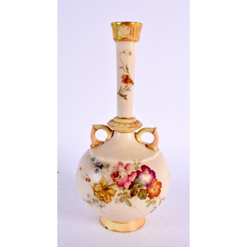 248 - Royal Worcester blush ivory two handled vase painted and gilded with flowers. 18cm high.