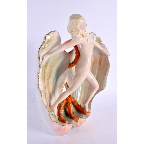 25 - AN ART DECO ITALIAN PORCELAIN FEMALE AND SHELL FIGURAL GROUP. 28 cm x 22 cm.