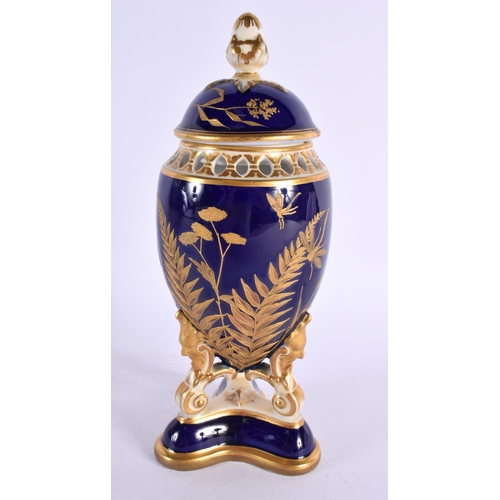 250 - Graingers Worcester vase and cover with cobalt blue ground decorated with raised gilt ferns. 21cm hi... 