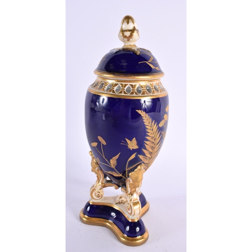 250 - Graingers Worcester vase and cover with cobalt blue ground decorated with raised gilt ferns. 21cm hi... 