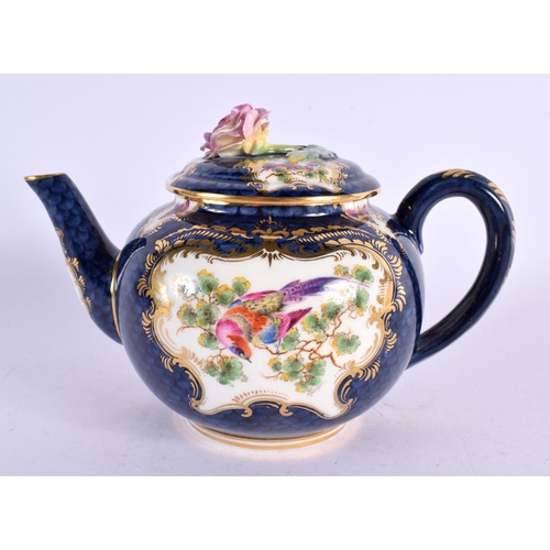 251 - Royal Worcester teapot and cover painted with exotic birds in gilt panels on a blue scale ground by ... 