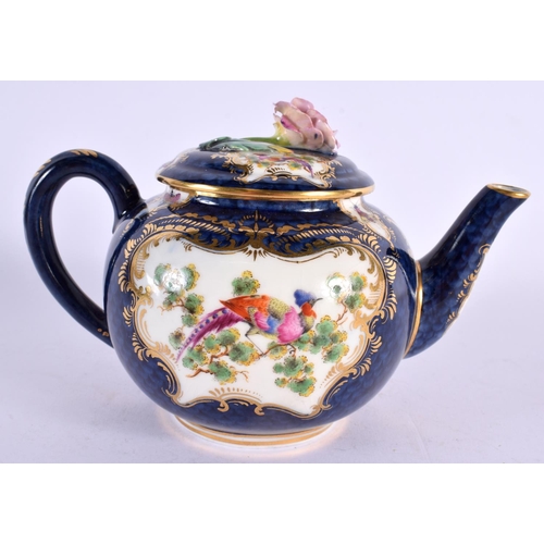 251 - Royal Worcester teapot and cover painted with exotic birds in gilt panels on a blue scale ground by ... 