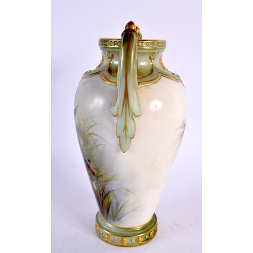 252 - Graingers Worcester painted with ducks in a reeded pond date mark 1901. 18.5cm high.