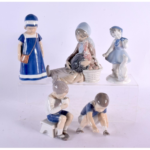 27 - A LLADRO FIGURE OF A GIRL WITH A TURKEY together with three Bing & Grondahl figures etc. Largest 18 ... 