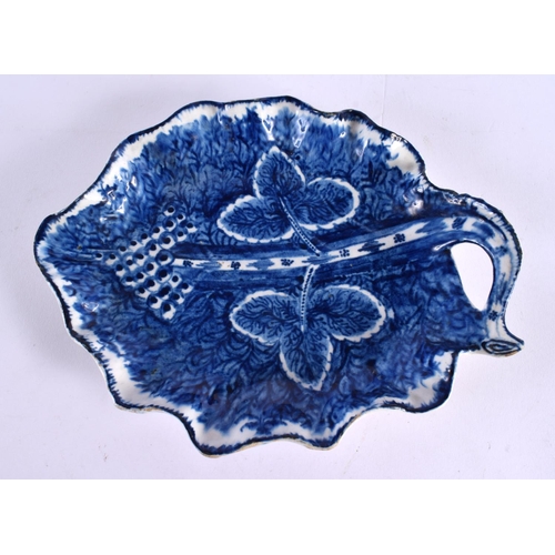 271 - 18th century Bow leaf shaped dish painted in blue with grape vine, with branch handle. 23cm wide.