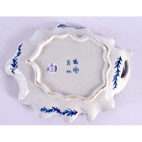 271 - 18th century Bow leaf shaped dish painted in blue with grape vine, with branch handle. 23cm wide.