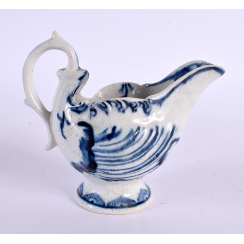 277 - 18th century Derby shell moulded ewer painted in underglaze blue with a half cell border. 6.5cm high... 