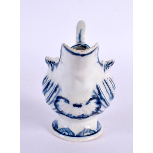 277 - 18th century Derby shell moulded ewer painted in underglaze blue with a half cell border. 6.5cm high... 