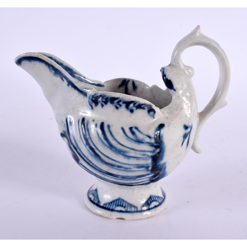 277 - 18th century Derby shell moulded ewer painted in underglaze blue with a half cell border. 6.5cm high... 