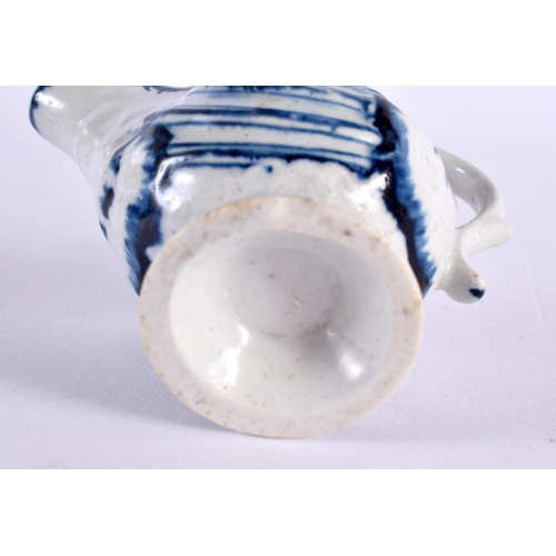 277 - 18th century Derby shell moulded ewer painted in underglaze blue with a half cell border. 6.5cm high... 