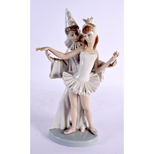 28 - A LLADRO FIGURE OF A BOY AND GIRL. 27 cm high.