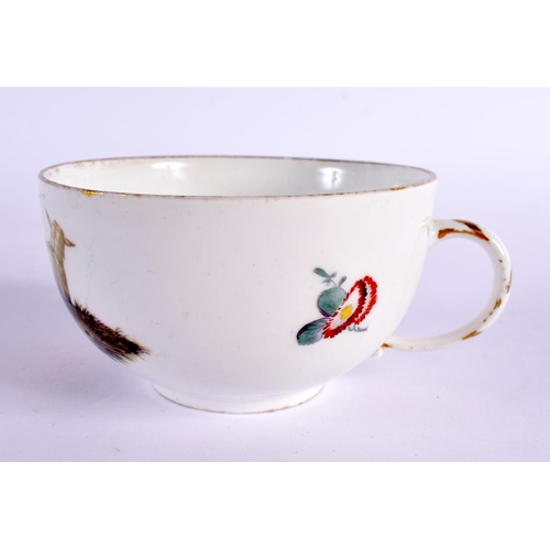 282 - 18th century Meissen teacup and saucer painted with children, crossed swords mark. Cup is 5cm high. ... 