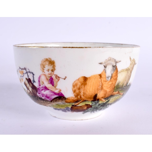 282 - 18th century Meissen teacup and saucer painted with children, crossed swords mark. Cup is 5cm high. ... 