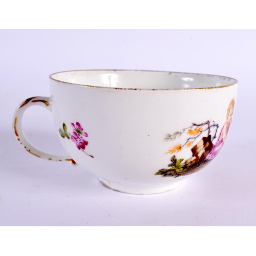 282 - 18th century Meissen teacup and saucer painted with children, crossed swords mark. Cup is 5cm high. ... 