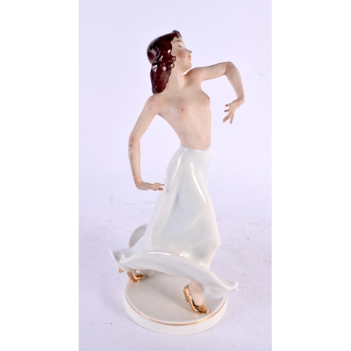 29 - AN ART DECO GERMAN PORCELAIN FIGURE OF A NUDE DANCER. 23 cm high.