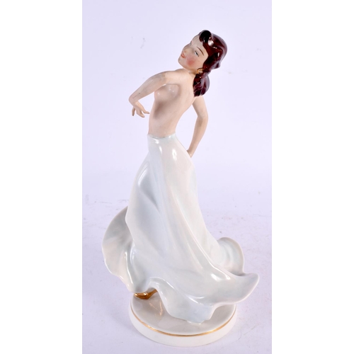 29 - AN ART DECO GERMAN PORCELAIN FIGURE OF A NUDE DANCER. 23 cm high.