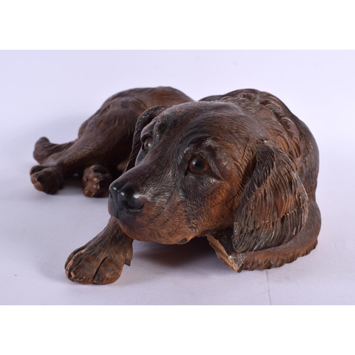 293 - A LARGE 19TH CENTURY BAVARIAN BLACK FOREST CARVED WOOD HOUND Attributed to Walter Mader. 30 cm x 18 ... 