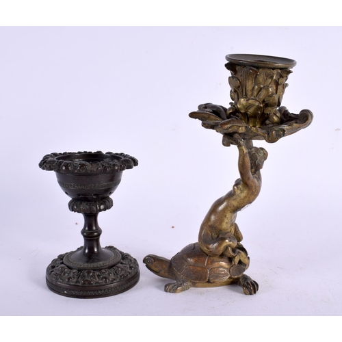 294 - A 19TH CENTURY EUROPEAN GRAND TOUR BRONZE FIGURAL CANDLESTICK together with a Regency bronze desk sa... 