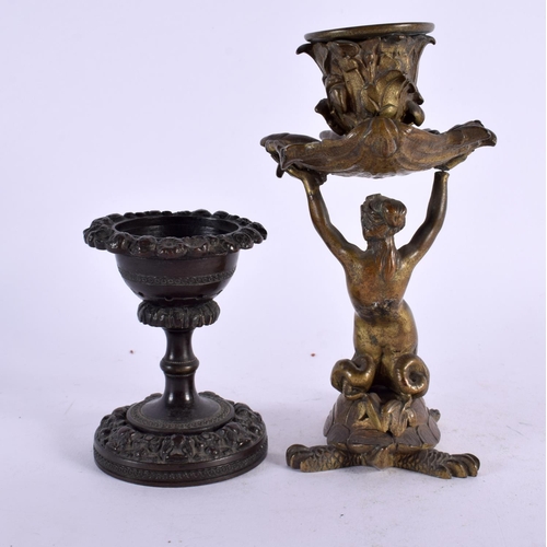 294 - A 19TH CENTURY EUROPEAN GRAND TOUR BRONZE FIGURAL CANDLESTICK together with a Regency bronze desk sa... 