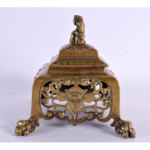 295 - A 19TH CENTURY EUROPEAN AESTHETIC MOVEMENT BRONZE INKWELL AND COVER formed with a seated Japanese fi... 