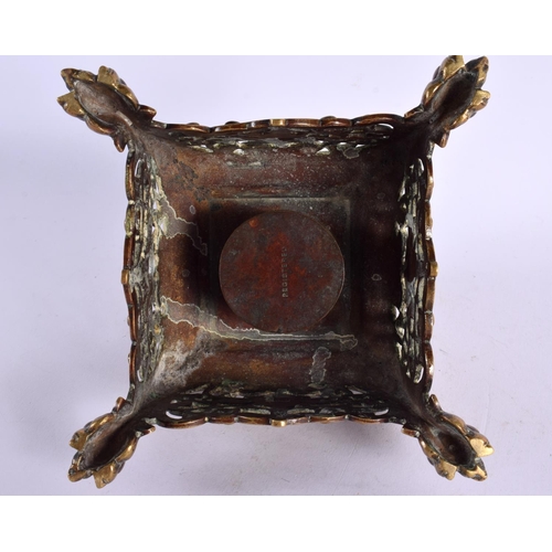 295 - A 19TH CENTURY EUROPEAN AESTHETIC MOVEMENT BRONZE INKWELL AND COVER formed with a seated Japanese fi... 