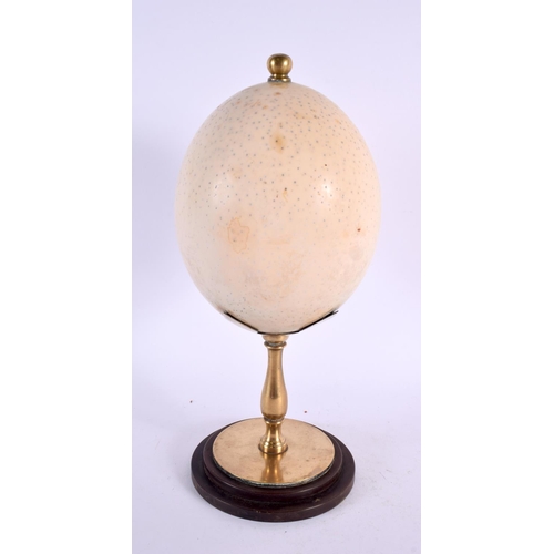 297 - AN EDWARDIAN TAXIDERMY BRONZE MOUNTED OSTRICH EGG. 28 cm high.