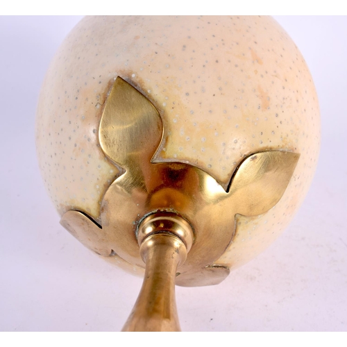 297 - AN EDWARDIAN TAXIDERMY BRONZE MOUNTED OSTRICH EGG. 28 cm high.