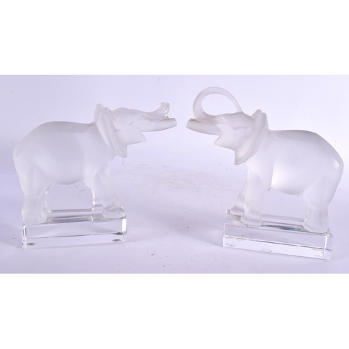 30 - A PAIR OF FRENCH LALIQUE GLASS ELEPHANTS. 16 cm x 14 cm.