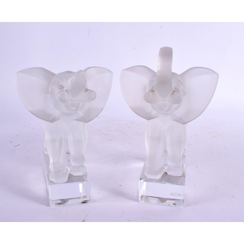 30 - A PAIR OF FRENCH LALIQUE GLASS ELEPHANTS. 16 cm x 14 cm.