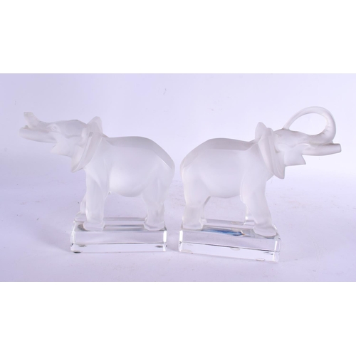 30 - A PAIR OF FRENCH LALIQUE GLASS ELEPHANTS. 16 cm x 14 cm.