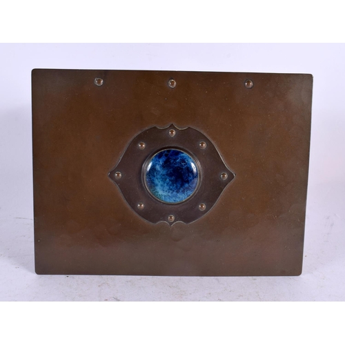 300 - AN ARTS AND CRAFTS COPPER AND RUSKIN ENAMEL CASKET with rising lid. 15 cm x 12 cm.