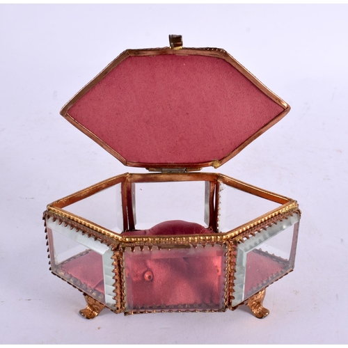 306 - AN ANTIQUE EUROPEAN REVERSE DECORATED GLASS JEWELLERY BOX. 12 cm x 7 cm.