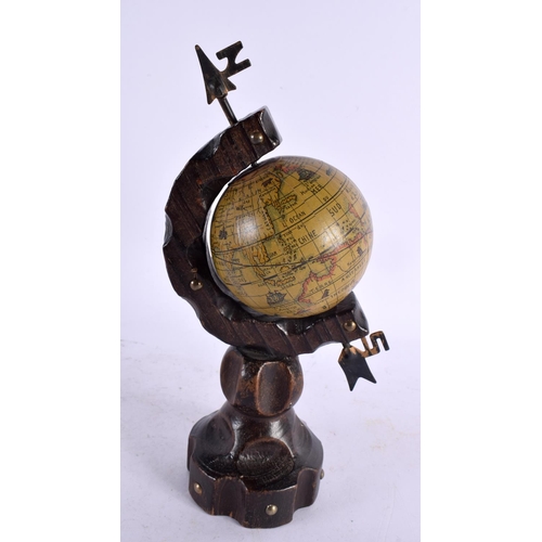 310 - AN UNUSUAL BAVARIAN BLACK FOREST KEY RACK together with a spinning terrestrial globe. Largest 21 cm ... 