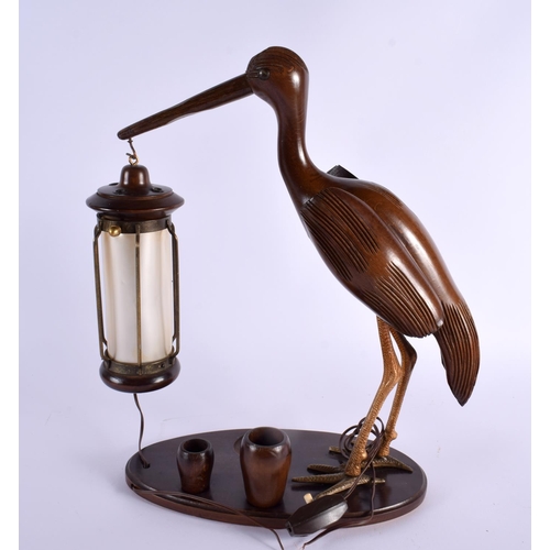 320 - AN ART DECO CARVED WOOD KIWI BIRD DESK LANTERN. 38 cm x 28 cm.