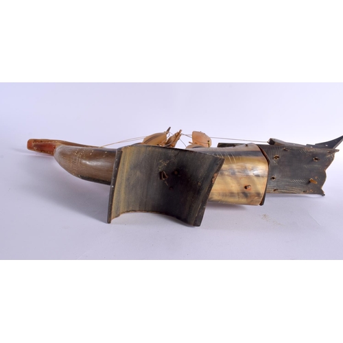 322 - A LARGE PAIR OF EARLY 20TH CENTURY MIDDLE EASTERN CARVED HORN BOATS formed with dragon and bird head... 