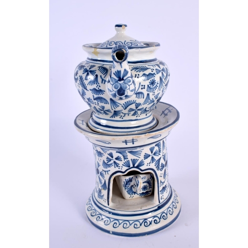 327 - A DELFT BLUE AND WHITE TEAPOT ON STAND painted with birds and foliage. 21 cm x 15 cm.