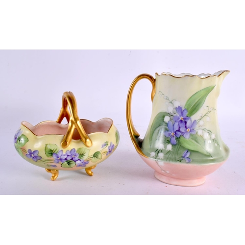 33 - A FRENCH LIMOGES ENAMEL PORCELAIN BASKET together with a similar jug. Largest 15 cm x 10 cm. (2)