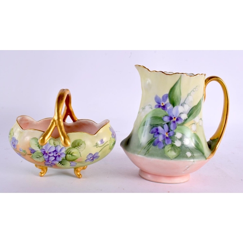 33 - A FRENCH LIMOGES ENAMEL PORCELAIN BASKET together with a similar jug. Largest 15 cm x 10 cm. (2)