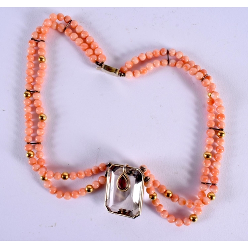 334 - AN ART DECO CORAL AND YELLOW METAL ROCK CRYSTAL NECKLACE. 64.5 grams. 48 cm long.