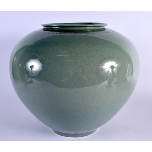 337 - A LARGE AND UNUSUAL KOREAN CELADON GLAZED JARLET painted with three figures within a sparse interior... 