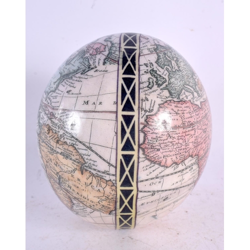 34 - AN UNUSUAL DECLOMANIA MAP OF THE WORLD OSTRICH EGG. 15 cm x 10 cm.