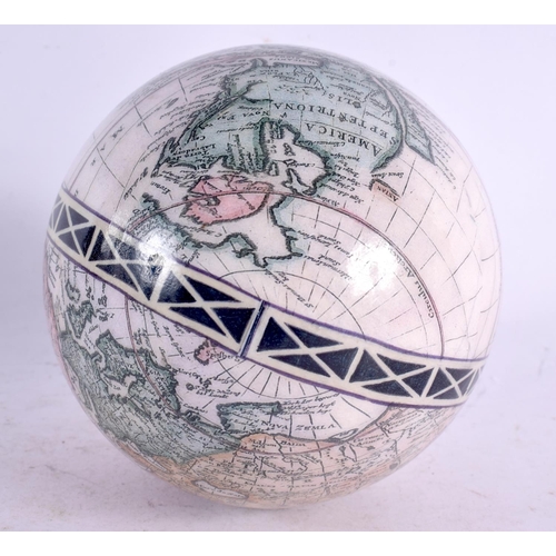 34 - AN UNUSUAL DECLOMANIA MAP OF THE WORLD OSTRICH EGG. 15 cm x 10 cm.