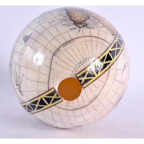 34 - AN UNUSUAL DECLOMANIA MAP OF THE WORLD OSTRICH EGG. 15 cm x 10 cm.