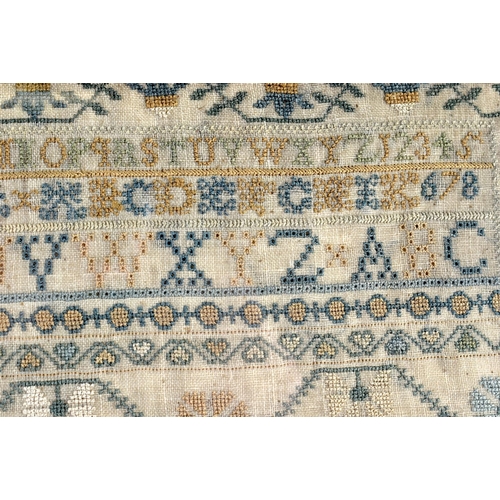 341 - AN EARLY 19TH CENTURY FRAMED AND EMBROIDERED ENGLISH SAMPLER depicting houses and landscapes. 54 cm ... 