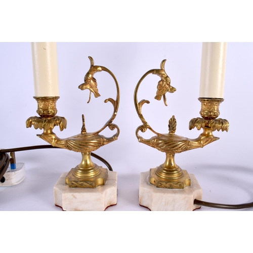 349 - A PAIR OF 19TH CENTURY EUROPEAN GRAND TOUR GILT BRONZE LAMPS After the Antiquity, formed as oil lamp... 